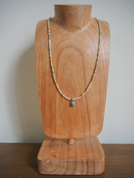 Melon heishi beaded necklace with sleeping beauty turquoise pendant